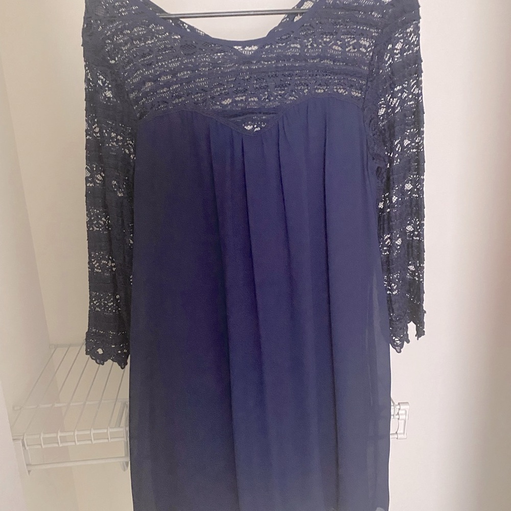 Navy blue dress with lacy shoulders and sleeves